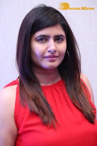 Ashima Narwal in a Red Dress