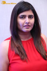 Ashima Narwal in a Red Dress