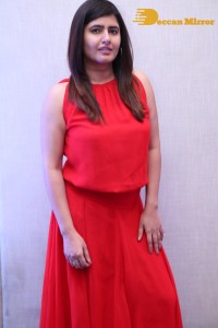 Ashima Narwal in a Red Dress