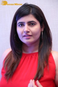 Ashima Narwal in a Red Dress