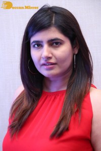 Ashima Narwal in a Red Dress