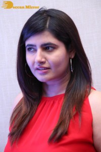 Ashima Narwal in a Red Dress