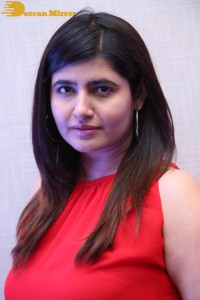 Ashima Narwal in a Red Dress