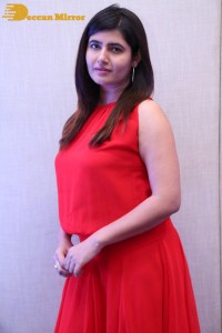 Ashima Narwal in a Red Dress