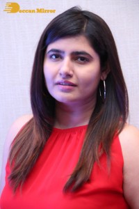 Ashima Narwal in a Red Dress