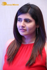 Ashima Narwal in a Red Dress