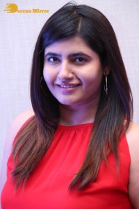 Ashima Narwal in a Red Dress