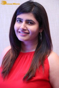 Ashima Narwal in a Red Dress