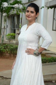 Actress Ashima Narwal dressed in white Salwar Kameez