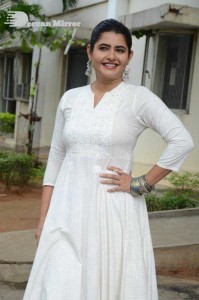 Actress Ashima Narwal dressed in white Salwar Kameez