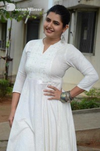Actress Ashima Narwal dressed in white Salwar Kameez