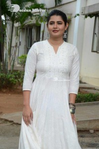 Actress Ashima Narwal dressed in white Salwar Kameez
