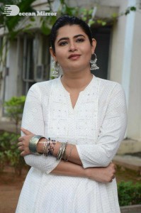 Actress Ashima Narwal dressed in white Salwar Kameez