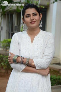 Actress Ashima Narwal dressed in white Salwar Kameez