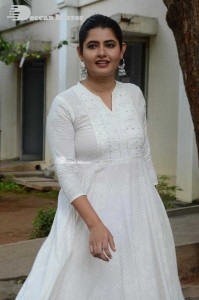 Actress Ashima Narwal dressed in white Salwar Kameez