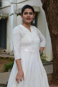 Actress Ashima Narwal dressed in white Salwar Kameez