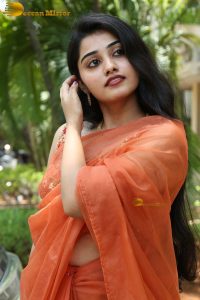 tollywood and tamil actress athira raj beautiful in a orange saree