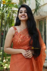 tollywood and tamil actress athira raj beautiful in a orange saree