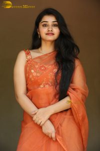 tollywood and tamil actress athira raj beautiful in a orange saree