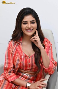 indian actress athulya ravi photoshoot in a orange dress