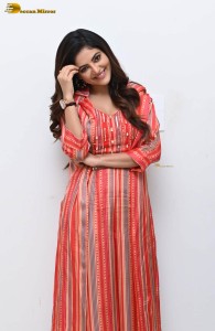 indian actress athulya ravi photoshoot in a orange dress