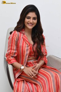 indian actress athulya ravi photoshoot in a orange dress