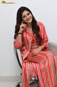 indian actress athulya ravi photoshoot in a orange dress