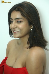 actress avantika mishra hot looks in a shouldlerless red dress