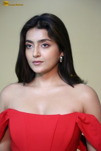 actress avantika mishra hot looks in a shouldlerless red dress