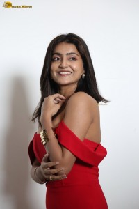 actress avantika mishra hot looks in a shouldlerless red dress