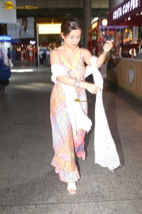 actress Avneet Kaur in a colorful dress at mumbai airport