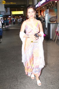 actress Avneet Kaur in a colorful dress at mumbai airport