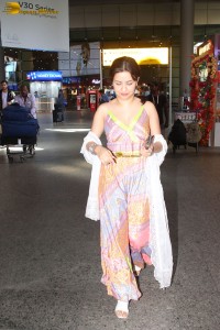 actress Avneet Kaur in a colorful dress at mumbai airport