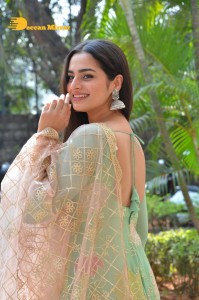 Actress Ayesha Khan in a green salwar