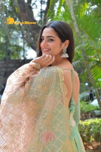 Actress Ayesha Khan in a green salwar