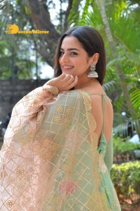 Actress Ayesha Khan in a green salwar