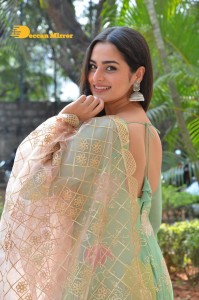 Actress Ayesha Khan in a green salwar
