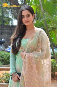 Actress Ayesha Khan in a green salwar