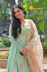 Actress Ayesha Khan in a green salwar