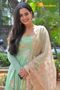 Actress Ayesha Khan in a green salwar