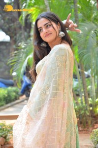 Actress Ayesha Khan in a green salwar