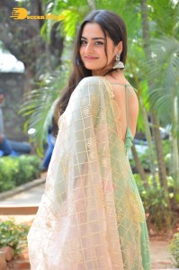 Actress Ayesha Khan in a green salwar