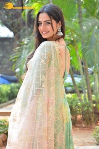 Actress Ayesha Khan in a green salwar