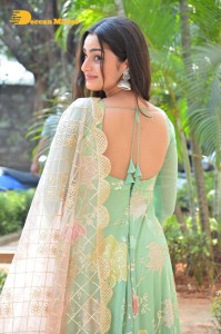 Actress Ayesha Khan in a green salwar
