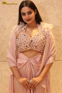 Indian Actress Ayesha Khan beautiful looks in a light orange dress