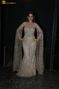 actress ayesha khan in a party dress at an event