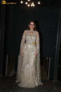 actress ayesha khan in a party dress at an event