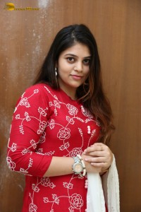 Telugu Actress Bandhavi Sridhar in a red salwar dress