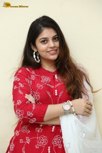 Telugu Actress Bandhavi Sridhar in a red salwar dress