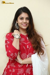 Telugu Actress Bandhavi Sridhar in a red salwar dress